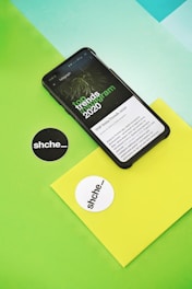 black iphone 7 on green table