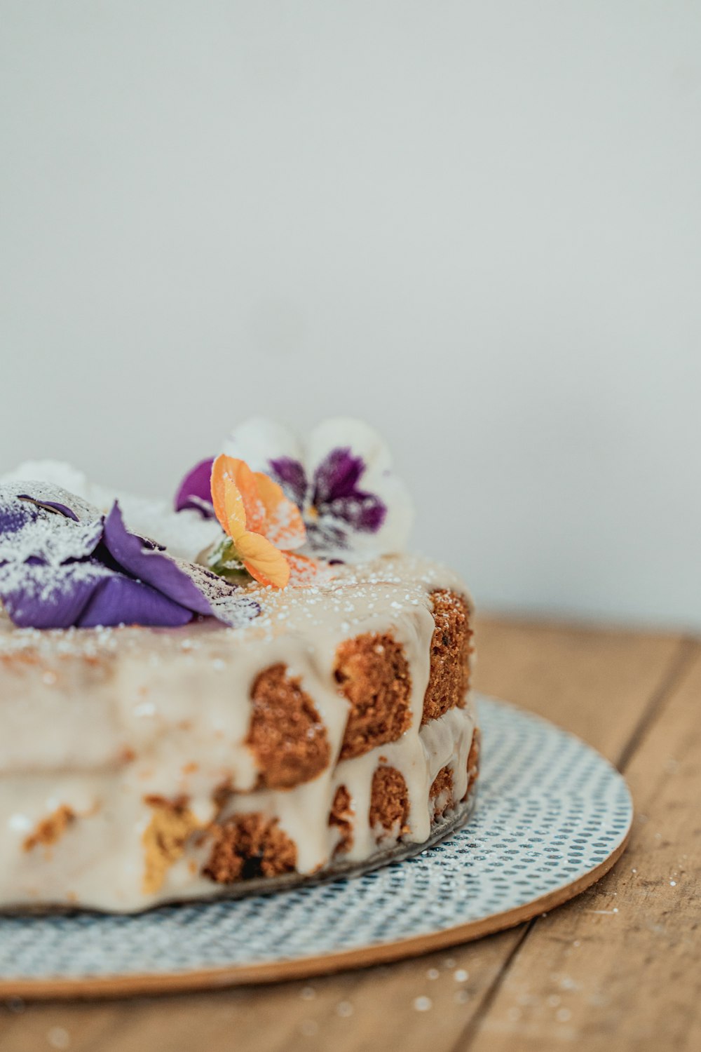 brown and white cake on white ceramic plate