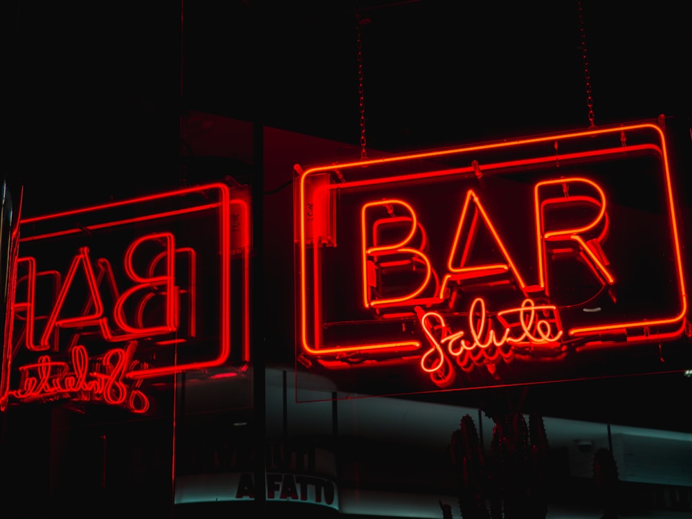 red and blue open neon light signage