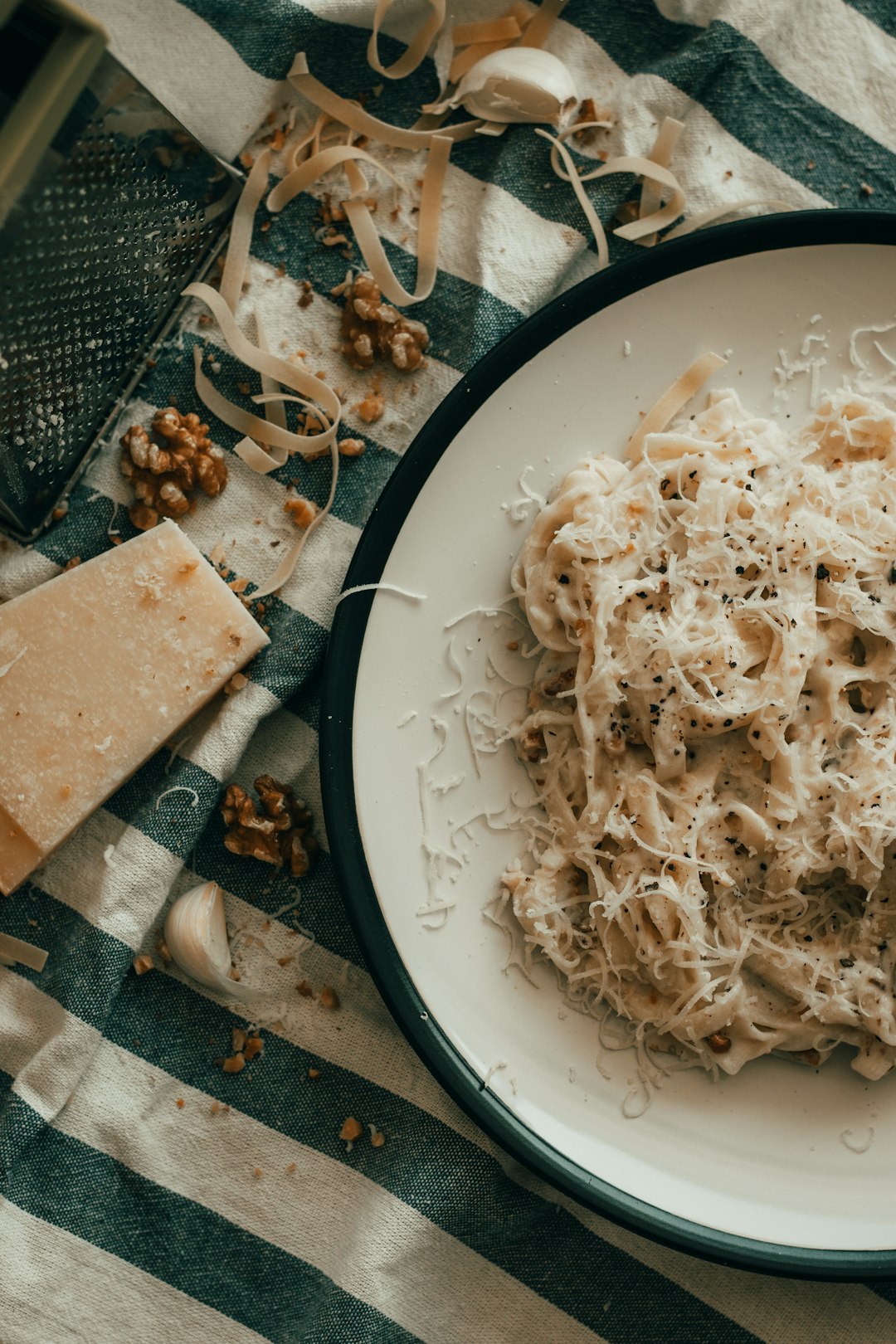 pasta dish on white and black ceramic plate