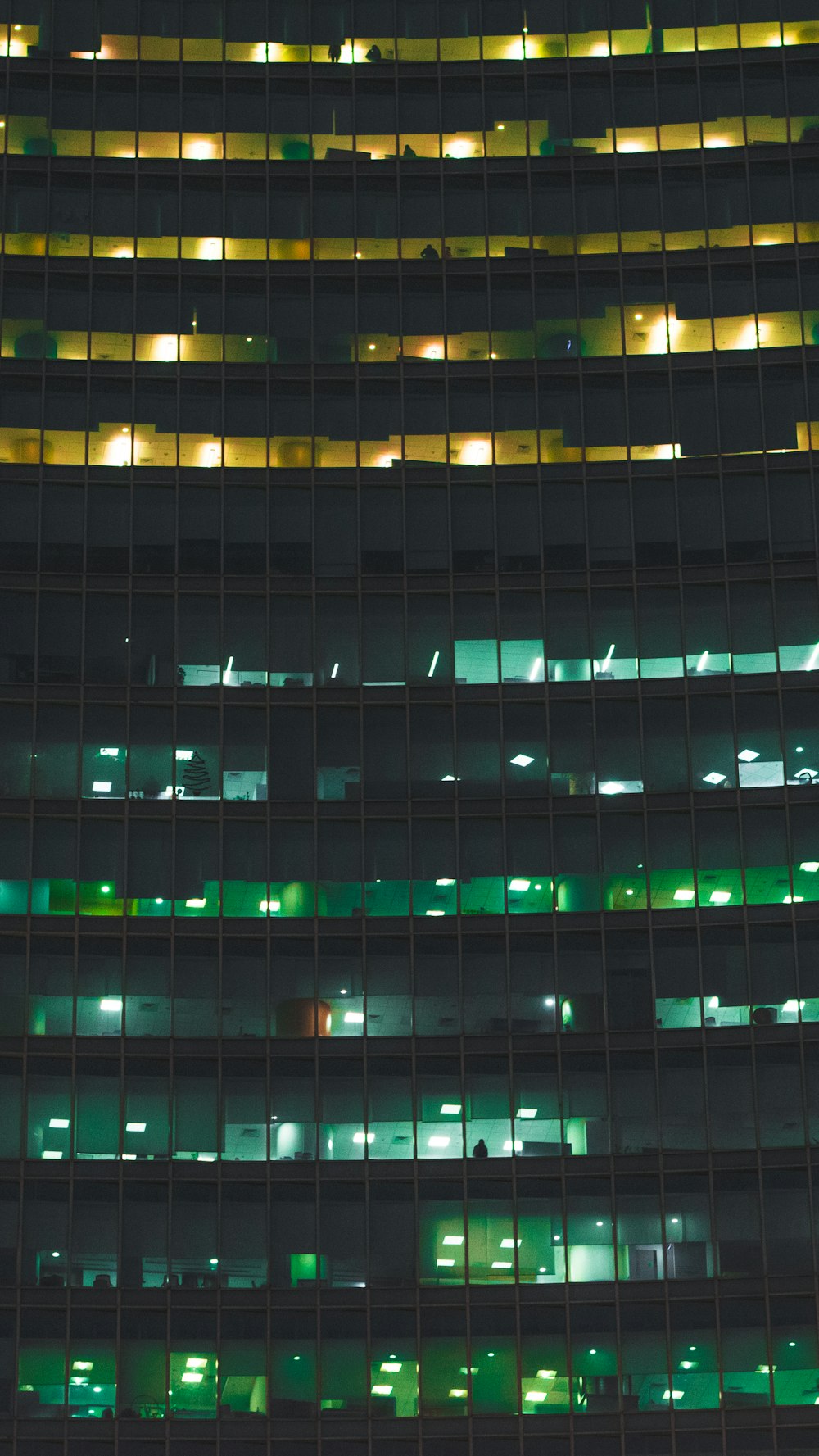 green and yellow lighted building