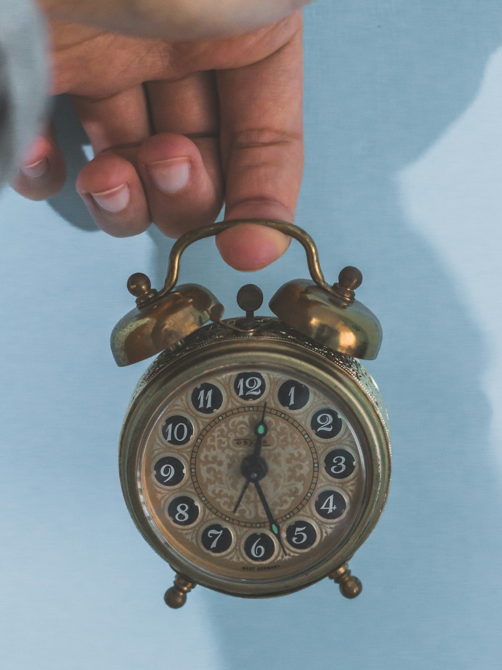 gold and white pocket watch