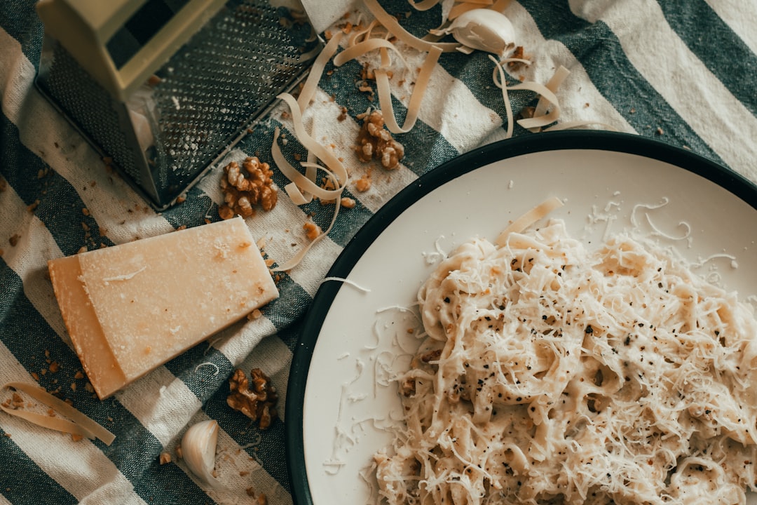 pasta dish on white and black ceramic plate