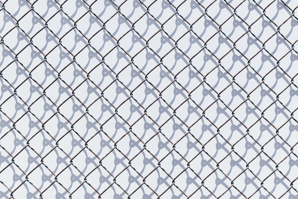black and white metal chain link fence