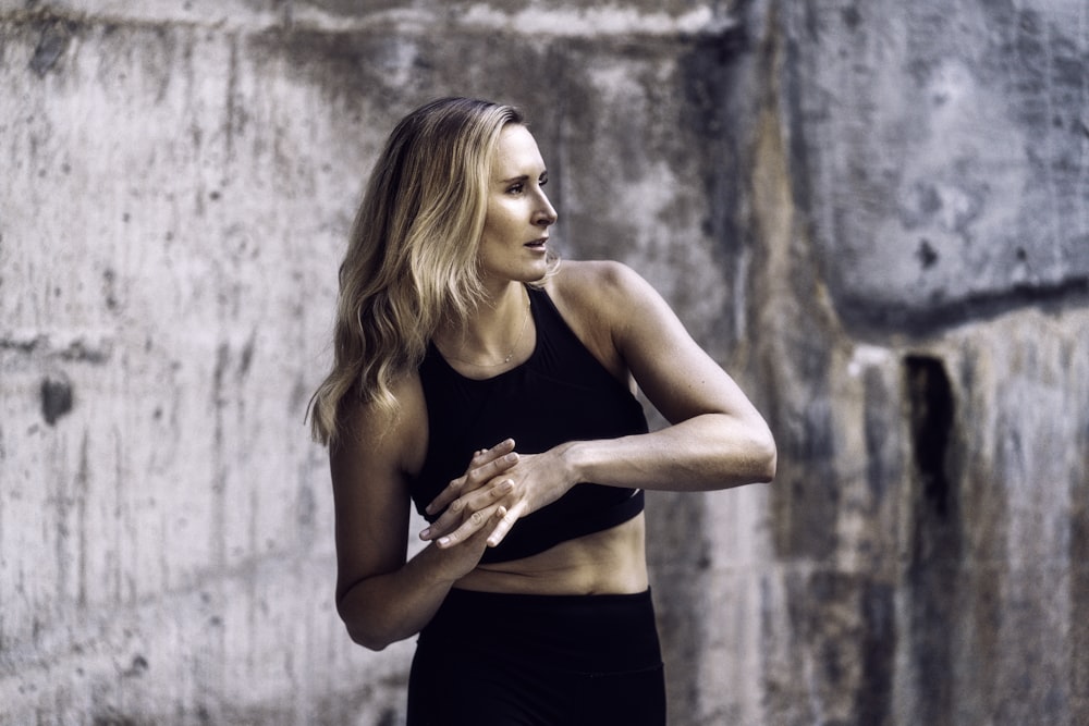 woman in black tank top and black shorts