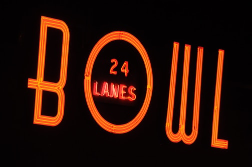 Exterior of Maple Lanes showing its nostalgic sign and charming facade.