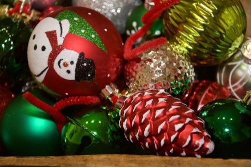 A collection of colorful ceramic Christmas ornaments.