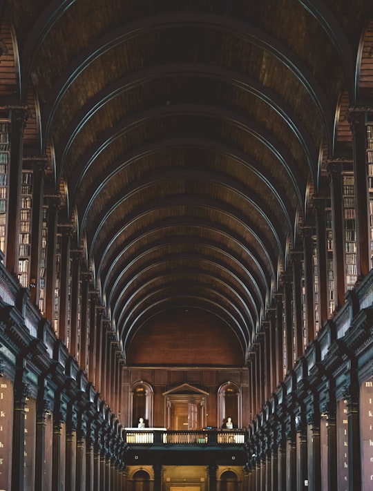 brown and black concrete building in Book of Kells Ireland