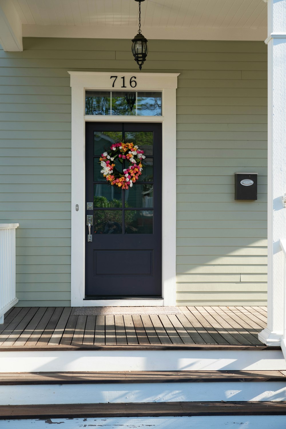 white wooden framed glass door