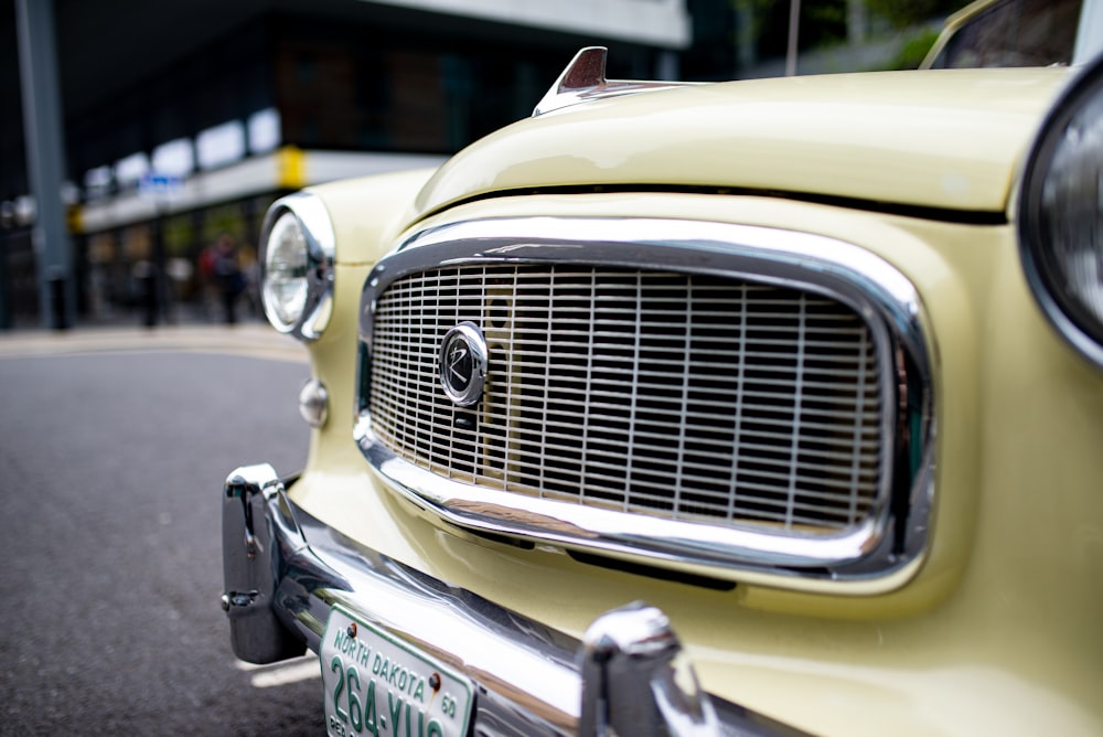 yellow car on the road during daytime