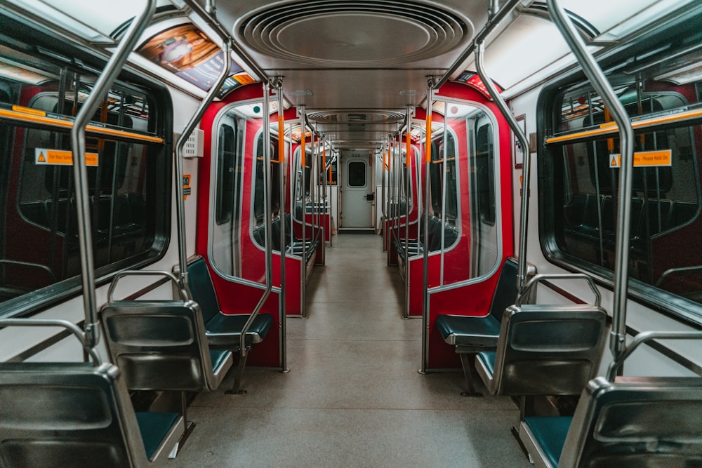 red and white train in train station