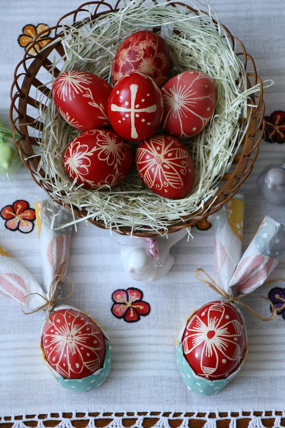 red and white baubles on brown woven basket