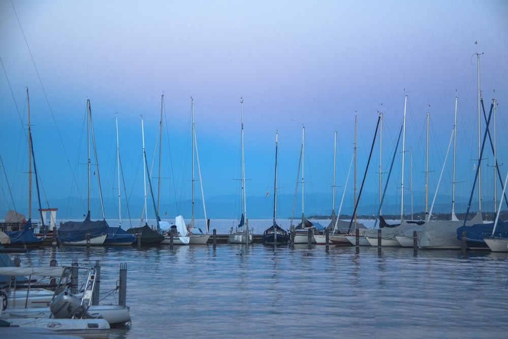 a bunch of boats that are sitting in the water