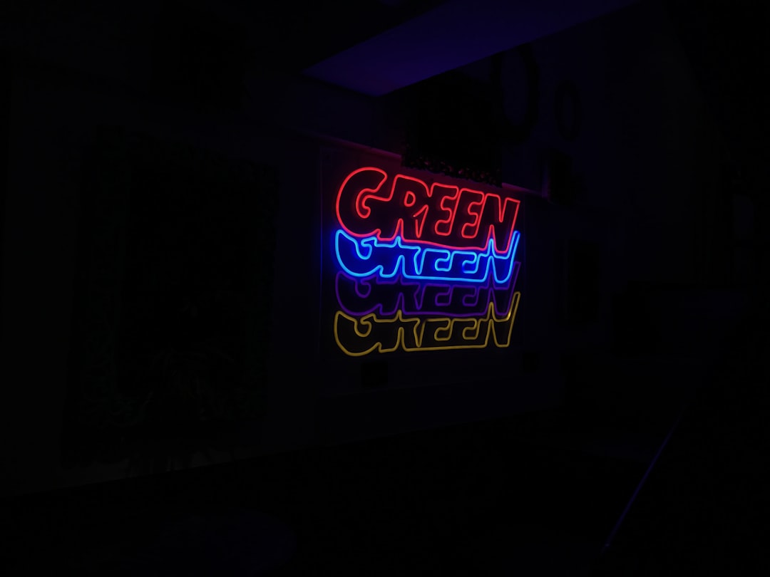 red and blue UNKs neon light signage,