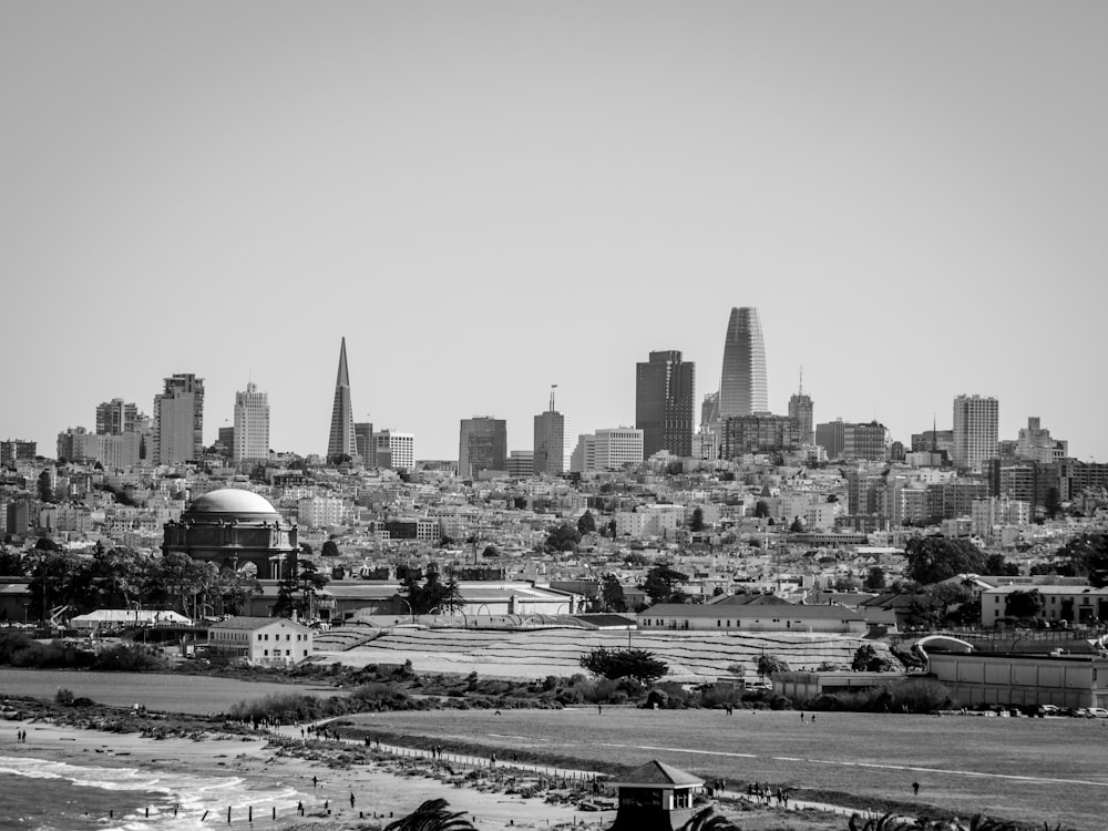 grayscale photo of city buildings