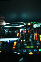 Sleek lighting controller with vivid neon-lit buttons and glowing interface.