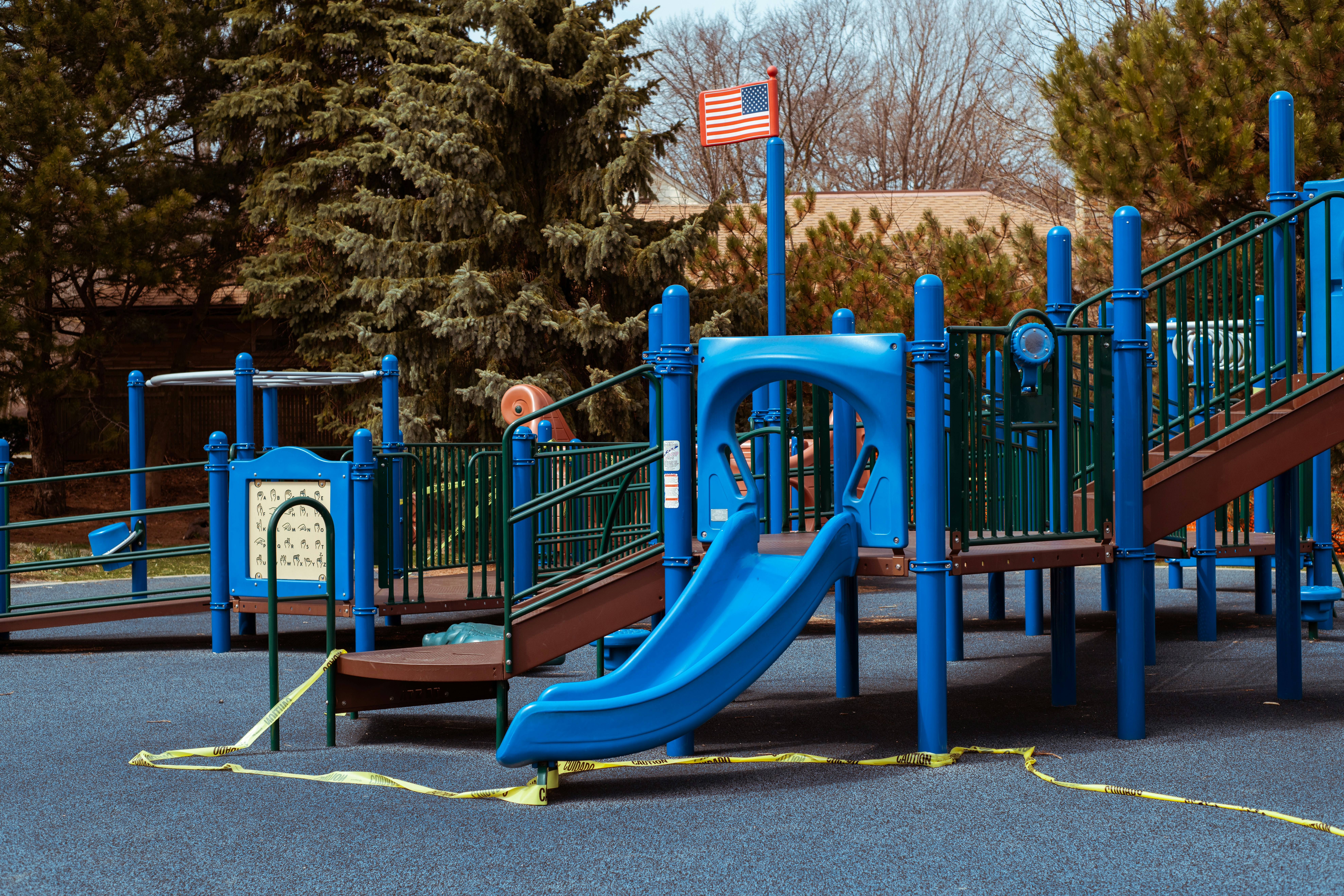 The children's playground at Atwater Park on Milwaukee's North Side is loosely taped off due to Corona Virus. The playground is one of hundreds taped off to prevent children from breaking social distancing laws. This is a measure taken along with several others from Tony Evers in Wisconsin to prevent the spread of Covid-19.