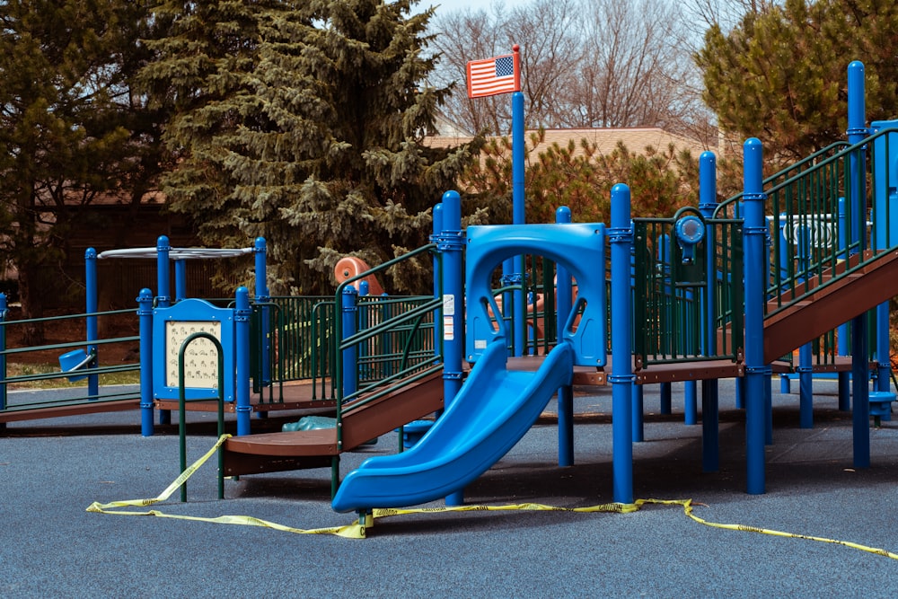 blue and yellow playground slide