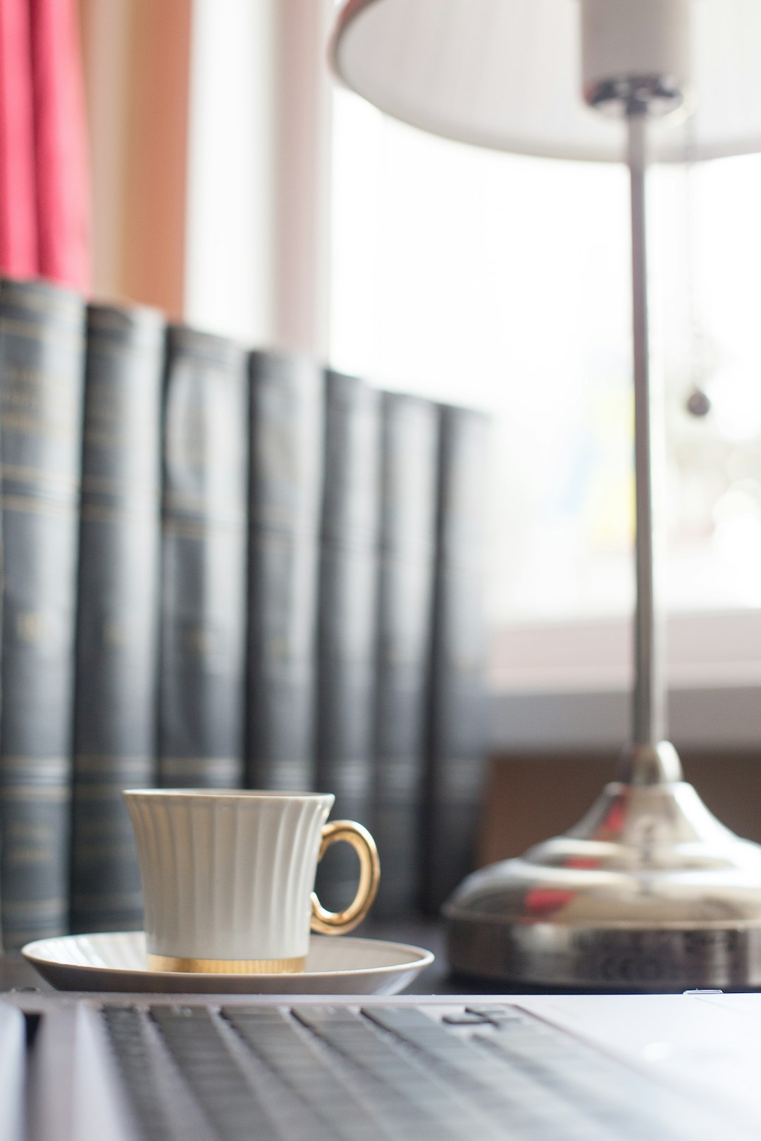 white ceramic cup on saucer