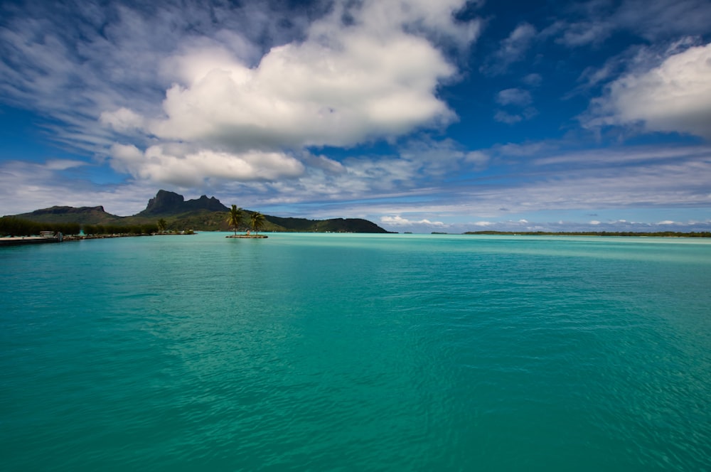 blue sea under blue sky during daytime