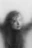 grayscale photo of womans face