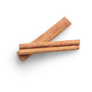 brown wooden stick on white surface