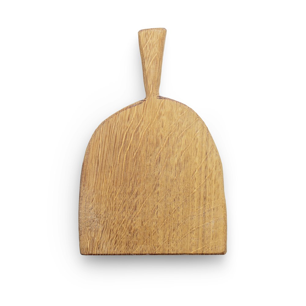 brown wooden chopping board on white surface