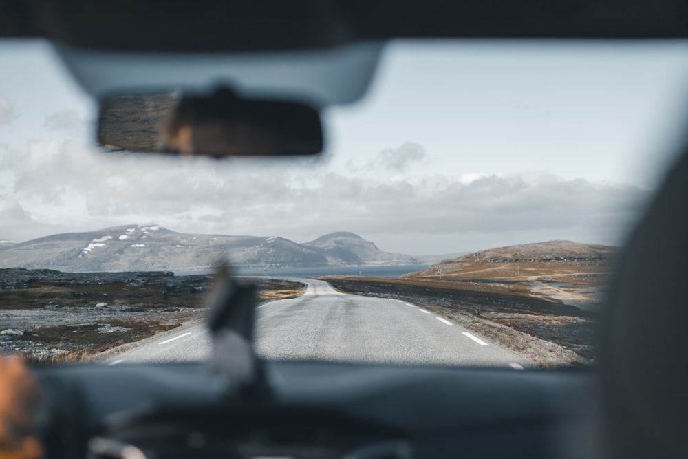 a view of a road from inside a vehicle