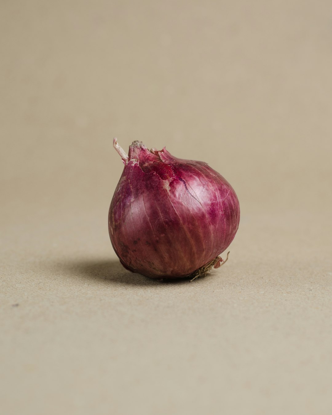 red onion on white table