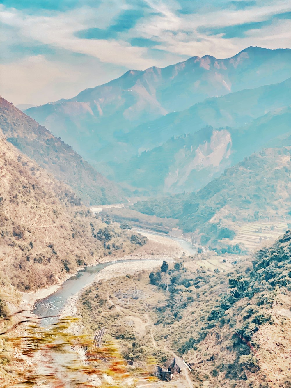 green mountains and river during daytime