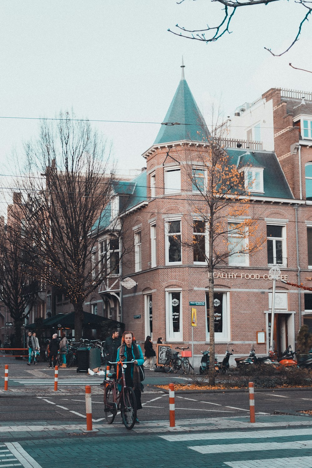 people walking on street near brown concrete building during daytime