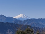 snow covered mountain under blue sky during daytime