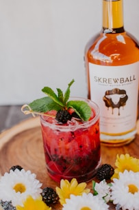 strawberry juice in clear drinking glass