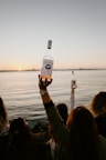 person holding white labeled bottle