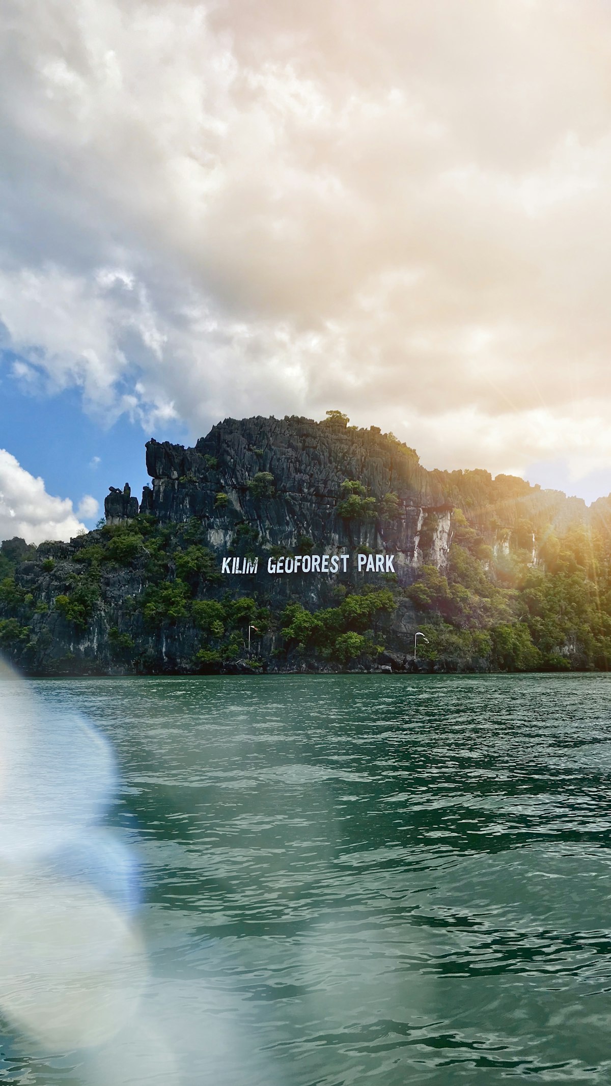 Pantai Cenang Langkawi — long beach with palms and sunset glow