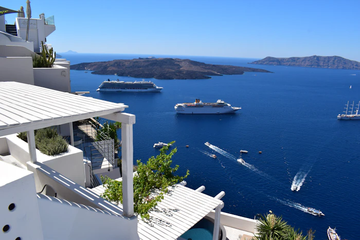 Private luxury yacht charter experience around Santorini's coastline and hidden beaches