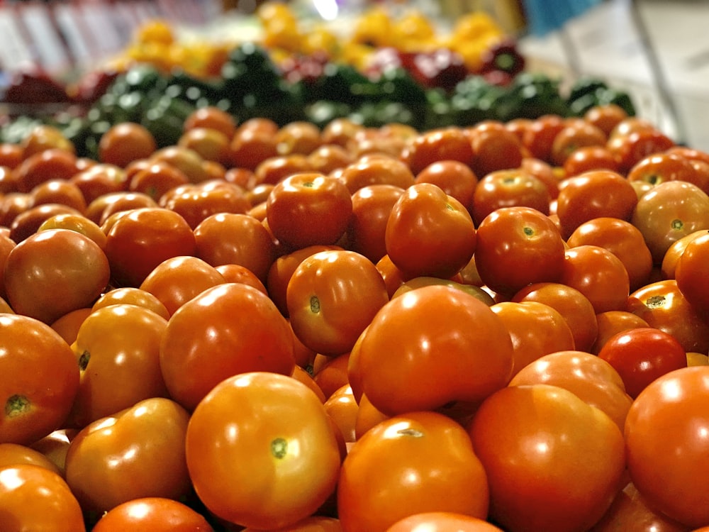 orange tomato fruit on display