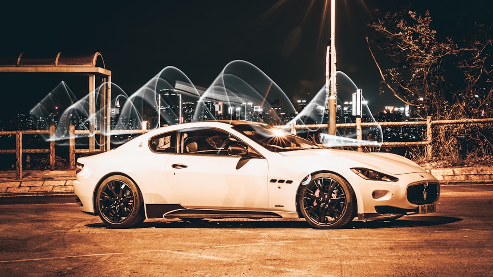 white porsche 911 on road at night