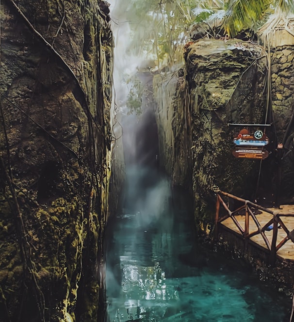 brown wooden bridge over river