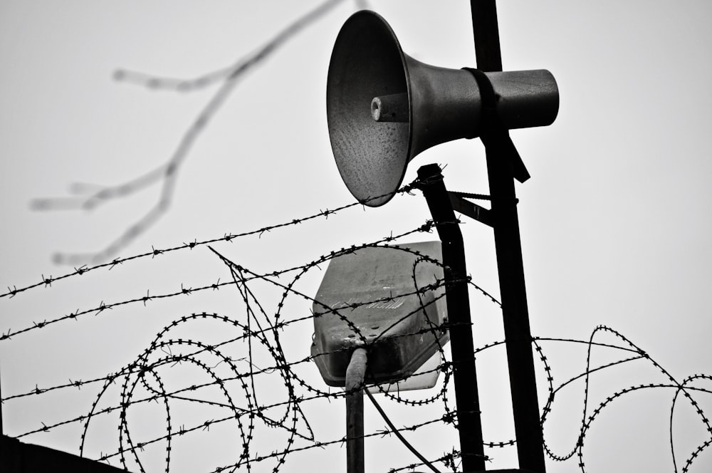 grayscale photo of light post