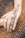 A close-up of intricate henna designs on a hand.