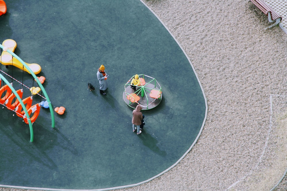 people walking on gray concrete pavement during daytime