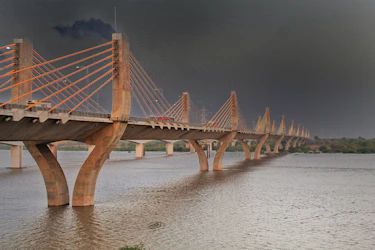 brown wooden bridge over water