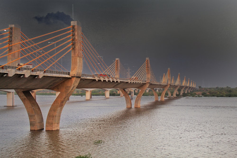 brown wooden bridge over water