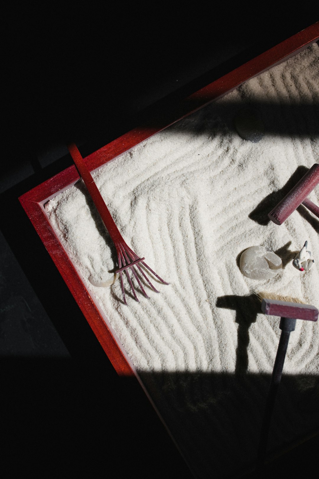 white and red textile on brown wooden table