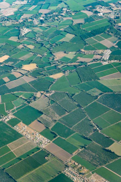 Aerial view of patchwork land plots showing varied ownership boundaries.