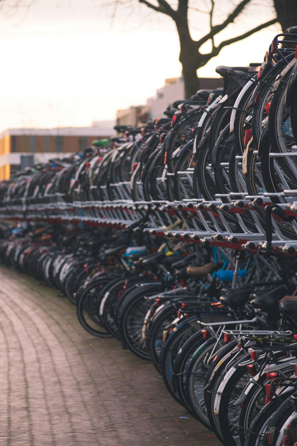 black and red bicycle parked on a parking lot