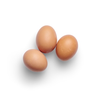 Three brown eggs are arranged in a triangular formation on a plain white background. The eggs have a smooth and slightly speckled surface.