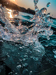 water splash on body of water