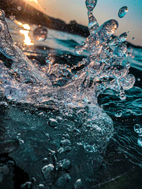 water splash on body of water